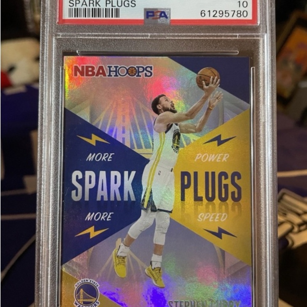 NBA Hoops Spark Plugs steph curyy. PSA10 Basketball Card.